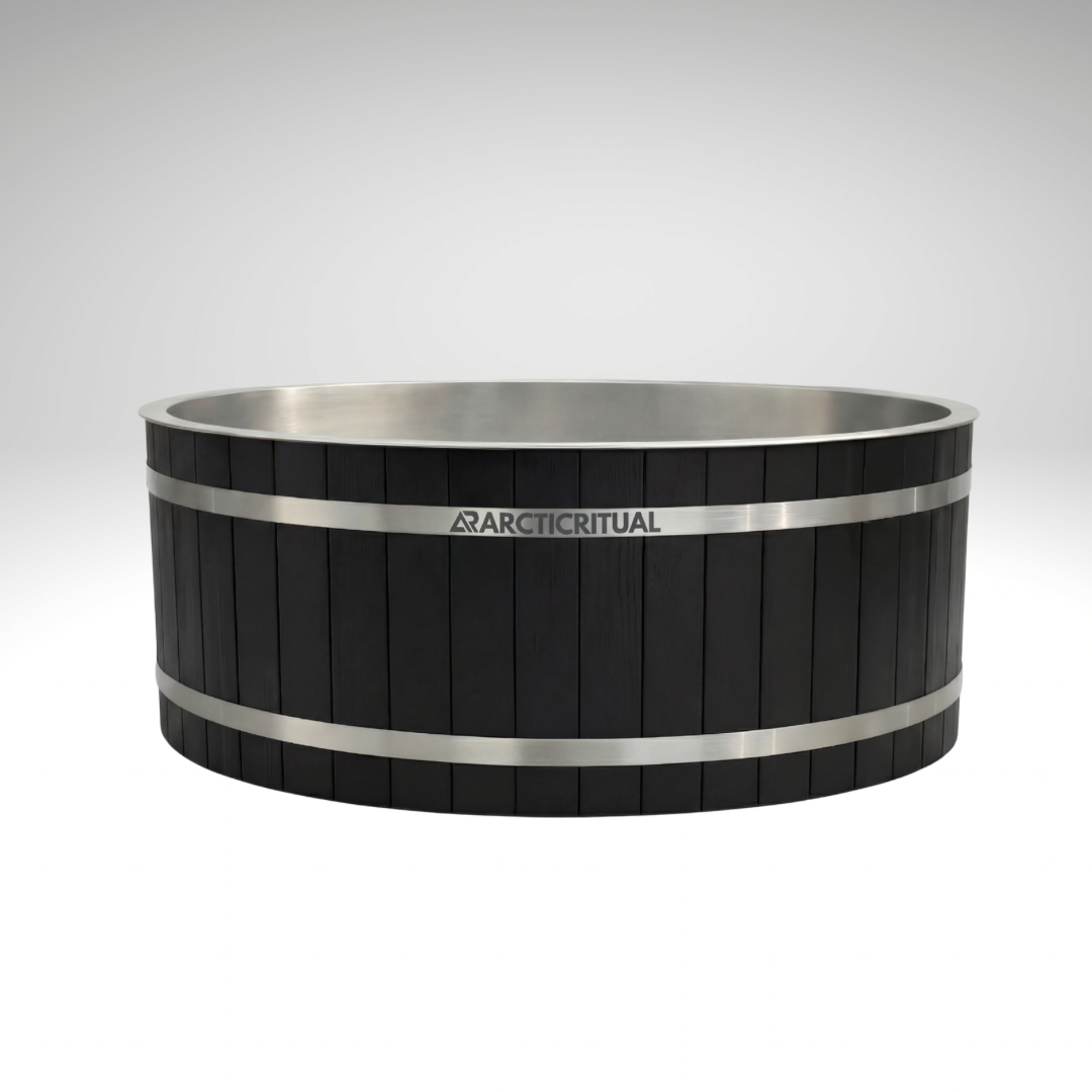 Arctic Ritual Cedar Pro cold plunge system in black cedar with stainless steel bands, photographed in a clean white studio background