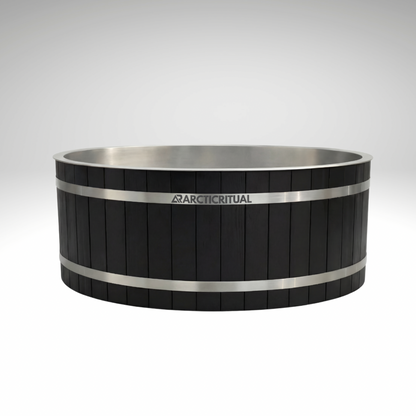 Arctic Ritual Cedar Pro cold plunge system in black cedar with stainless steel bands, photographed in a clean white studio background