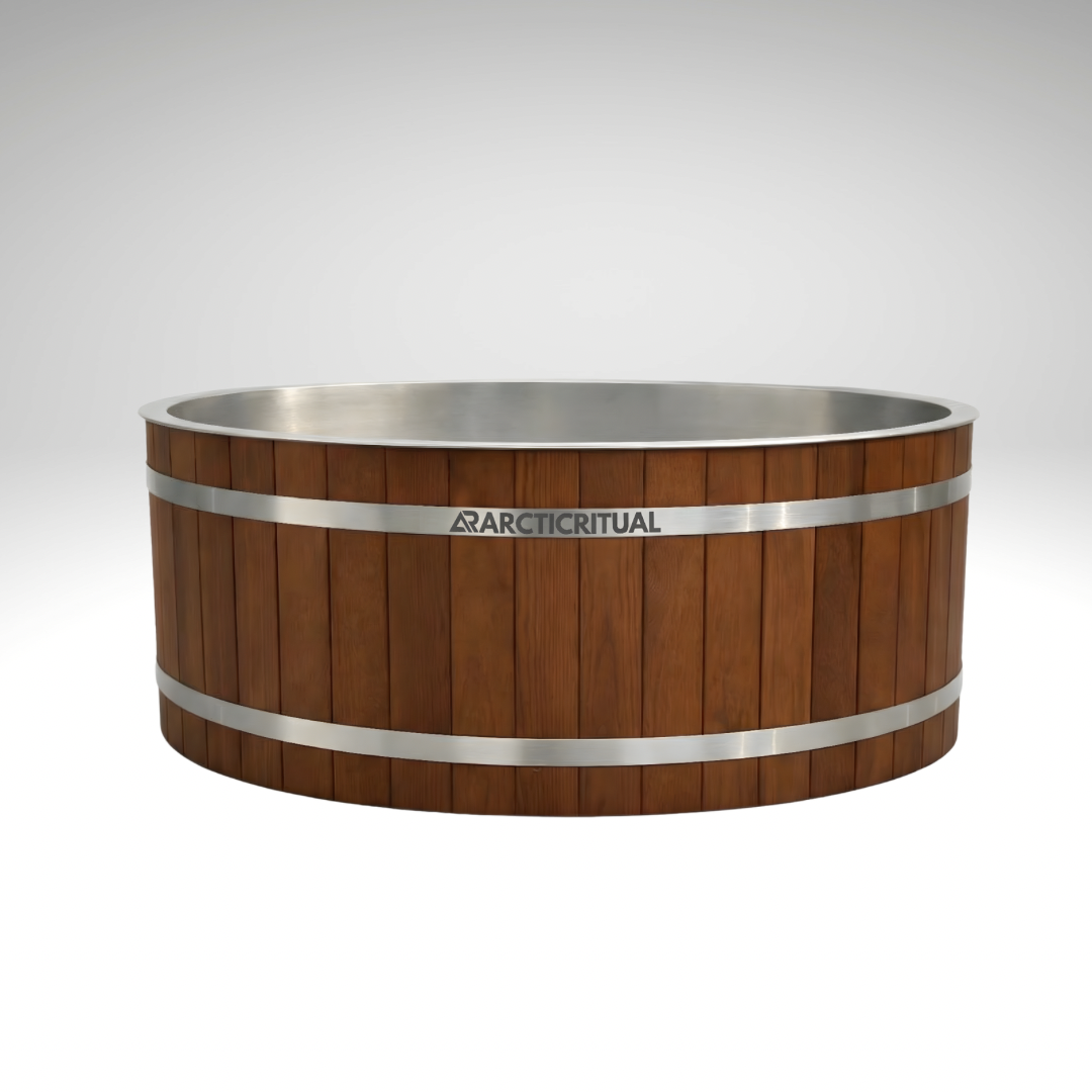 Arctic Ritual Cedar Pro cold plunge tub with natural cedar wood exterior and stainless steel interior, photographed in a clean studio setting