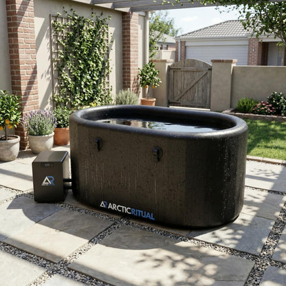 Arctic Ritual cold plunge tub Lite+ system installed in a modern backyard setting with external chiller for home ice bath recovery and cold exposure