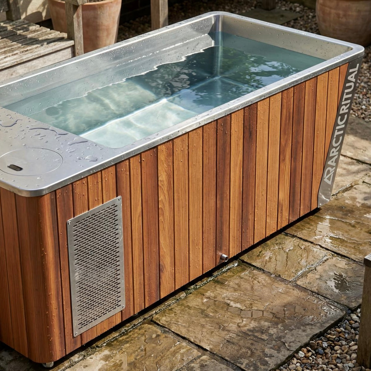 Arctic Ritual Platinum All-in-One cold plunge tub in cedar finish installed outdoors for home ice bath and recovery